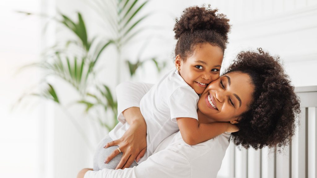 WIC mother holding toddler