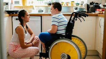 Person in a wheelchair link to Complex Medical Help page
